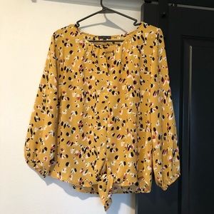 Cute lightweight dress shirt. Size small.